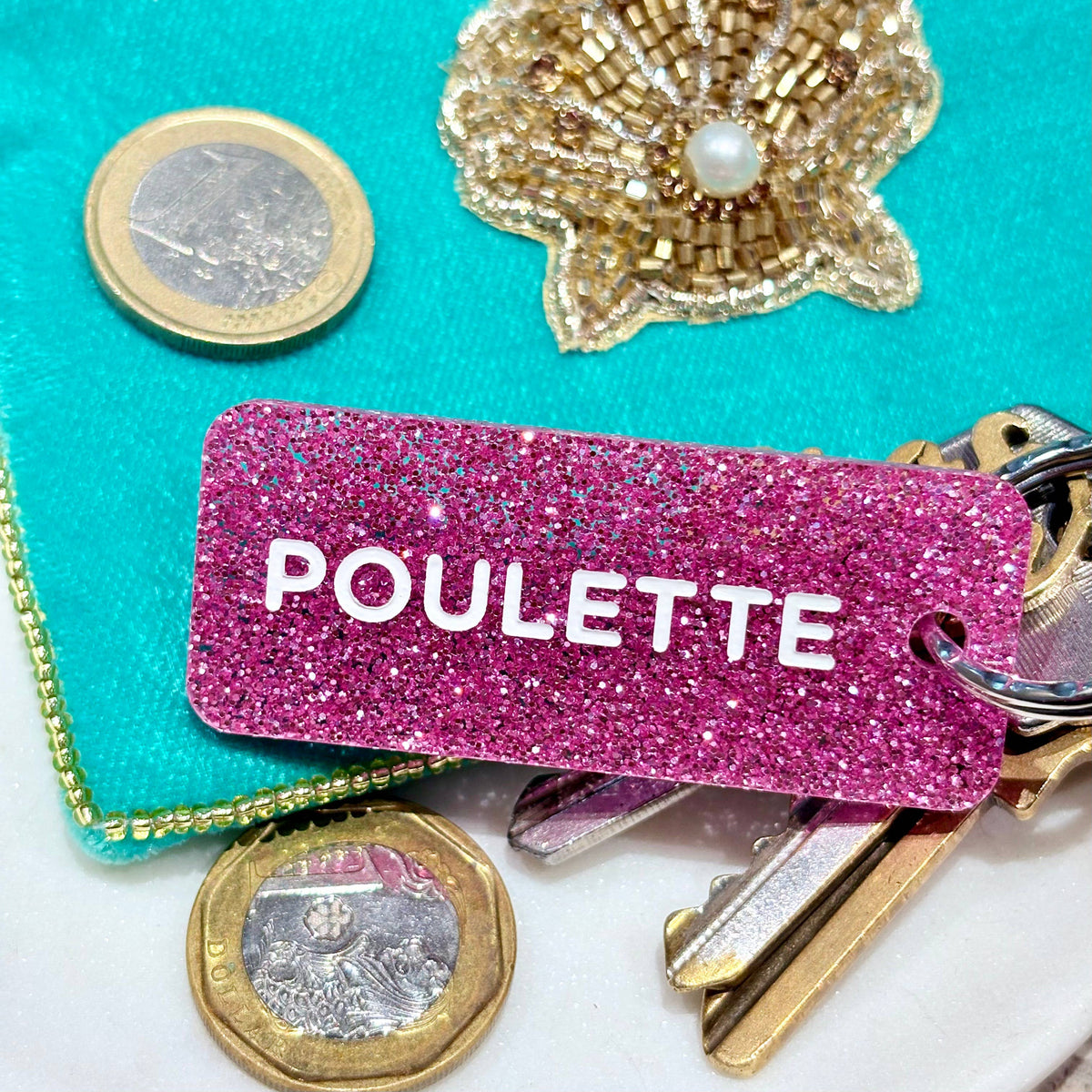 Porte clé à paillettes : poulette