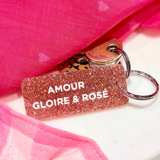 Porte clé à paillettes : amour gloire et rosé